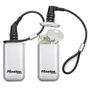 Master Lock 5408D mini safe key storage with combination shown with money and keys.